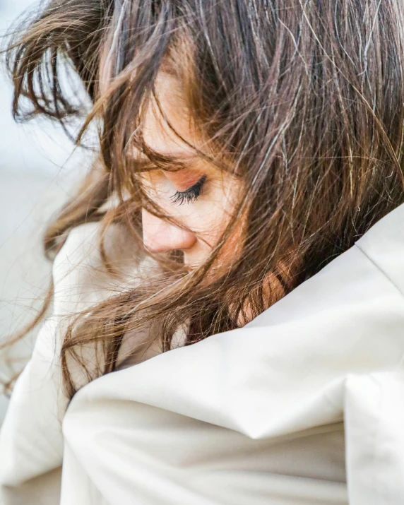 a close up view of a woman with long hair