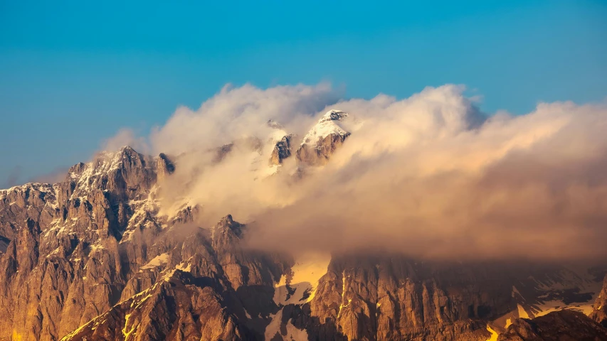 a mountain with a bunch of mountains in the background