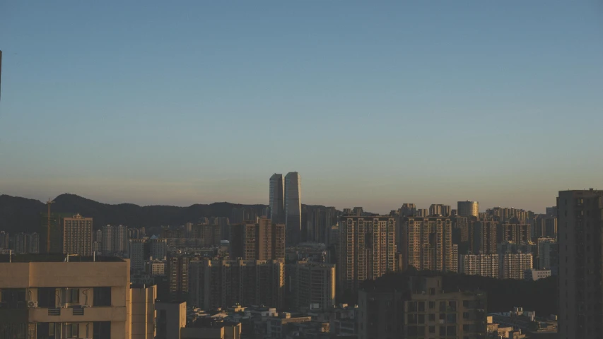 buildings in the city with tall skyscrs in the background