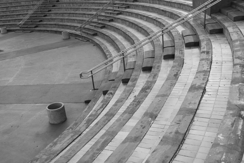 an empty large arena seat with a ladder in it