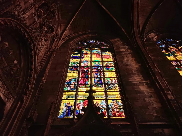 the large stained glass windows in the cathedral have been designed to resemble the cross