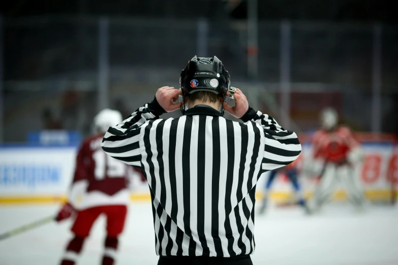 a referee is watching for his teams to come up against