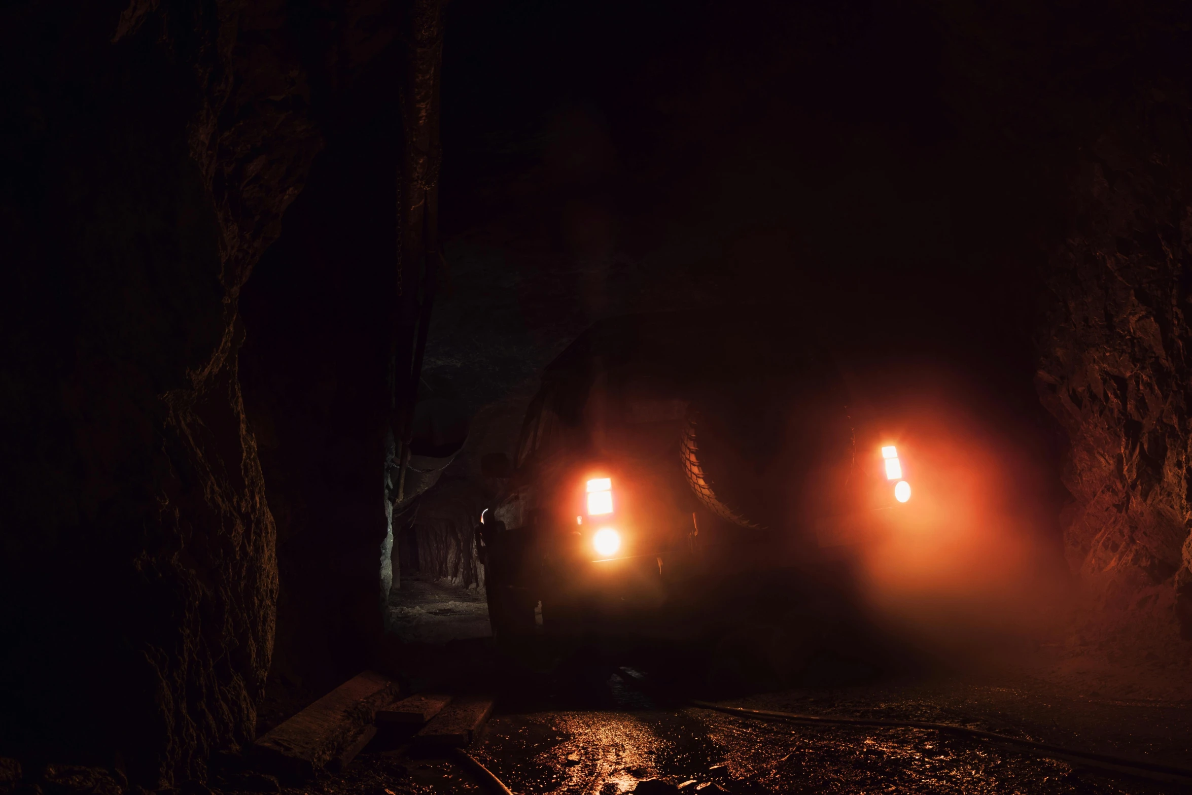 a train traveling through a tunnel at night