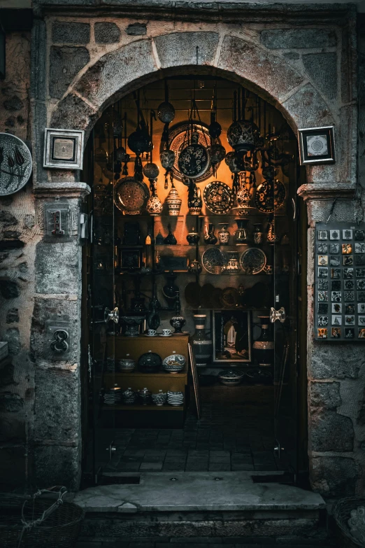 a doorway with the front part of a store showing a clock