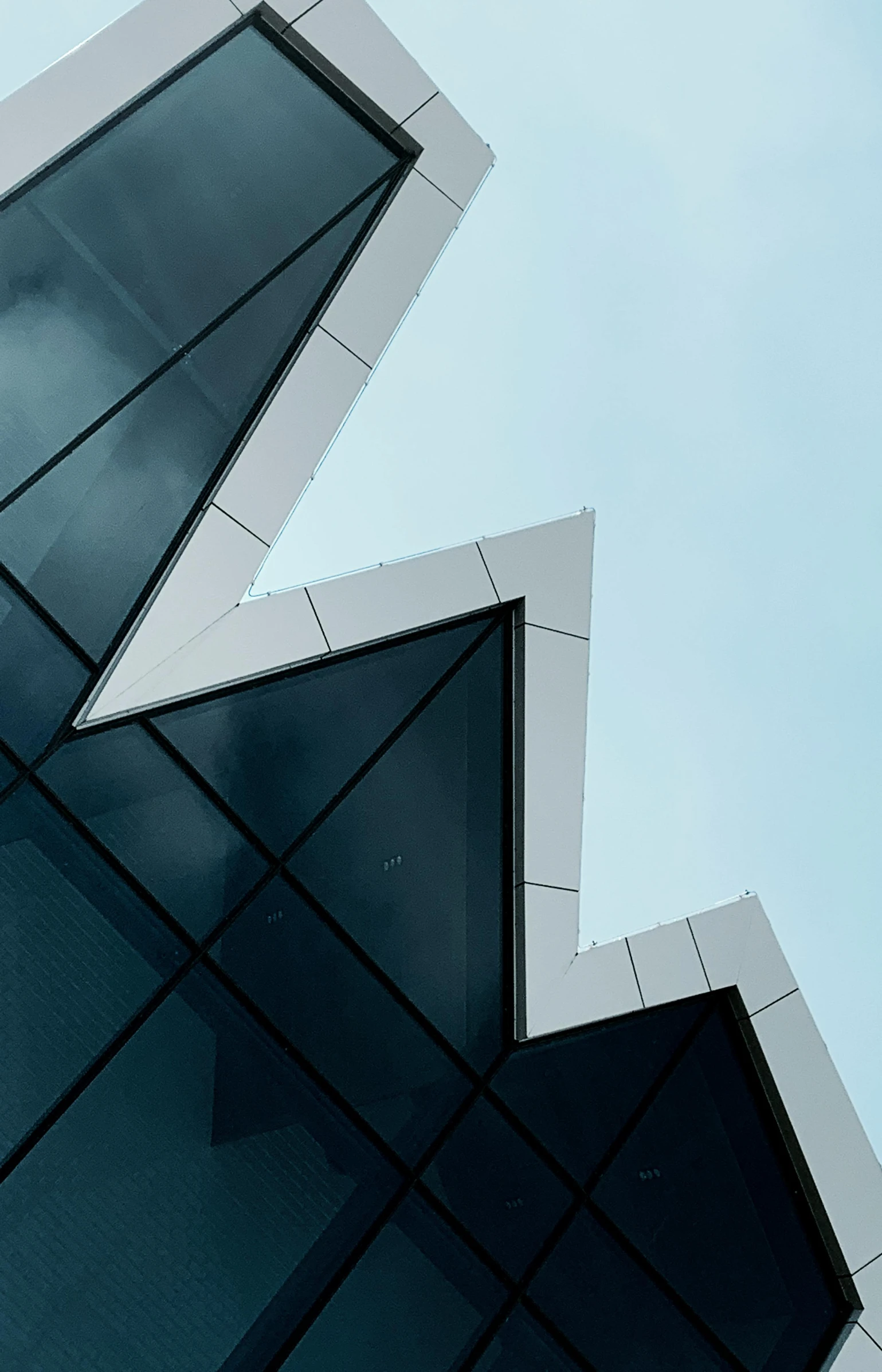 the triangular building is designed as an optical geometric object