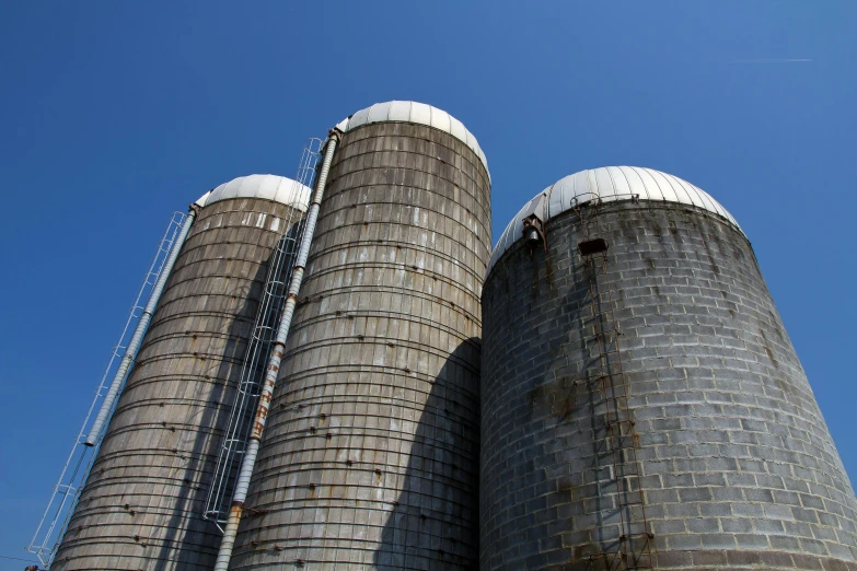 there is a building with many stacks of tanks