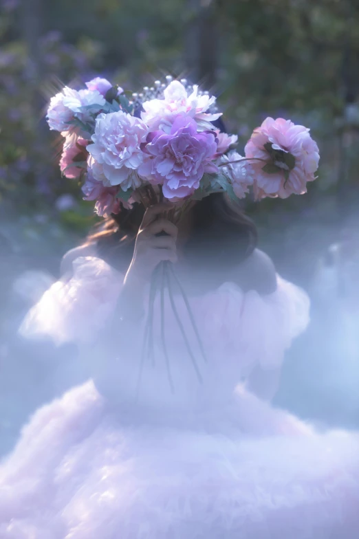 pink and white flowers are placed in the headpiece