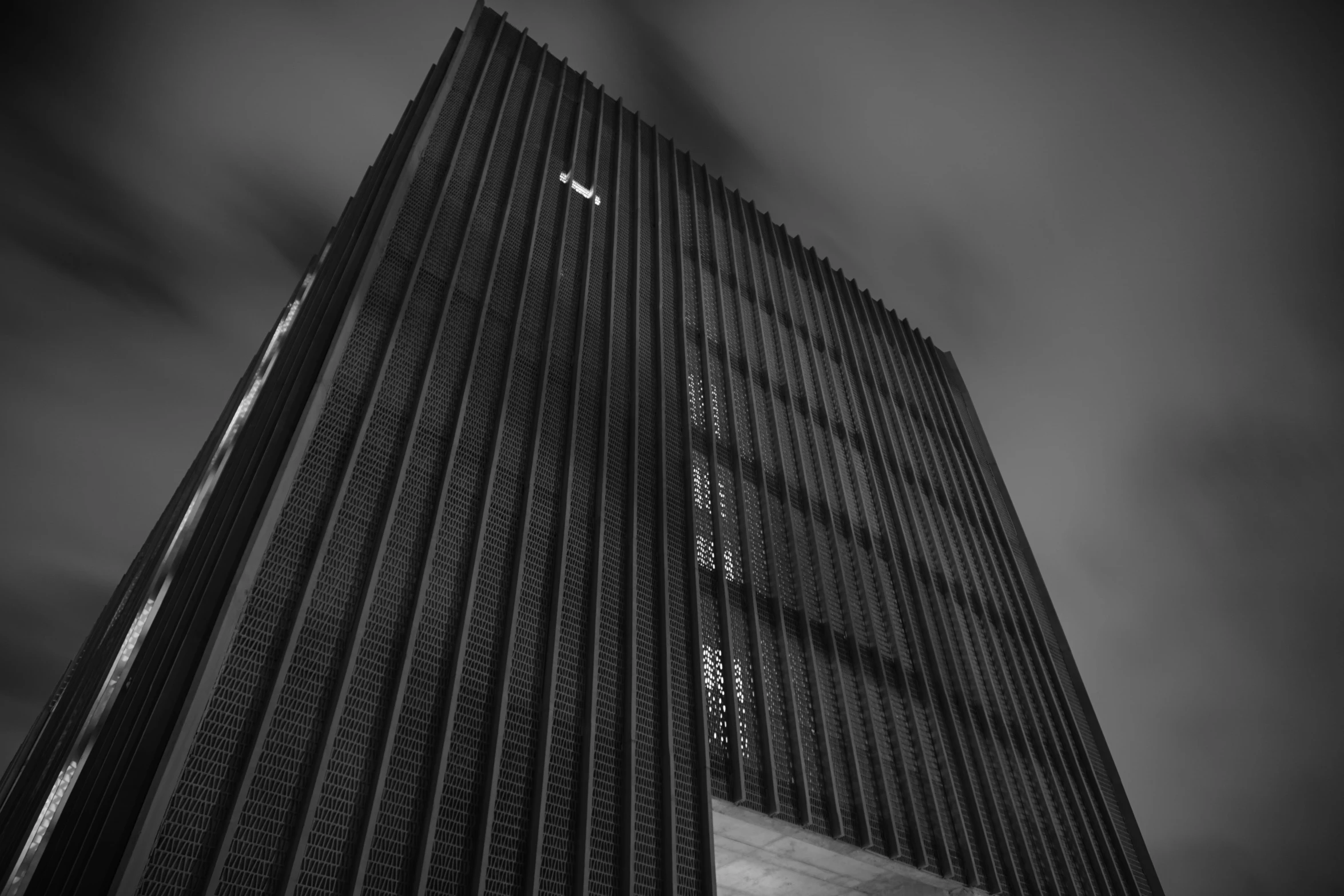 a black and white po of the top of the building