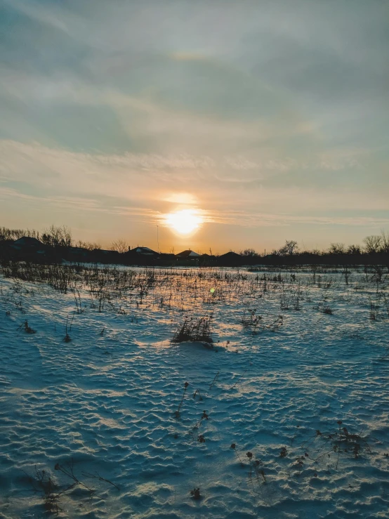 a beautiful view of water as the sun sets