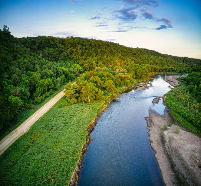 an image of a small road next to the river