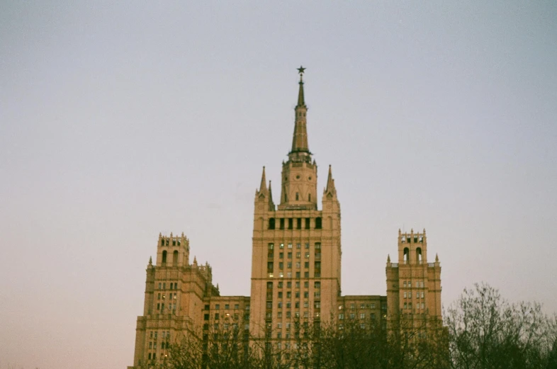 a view of a very big building with a steeple on the top