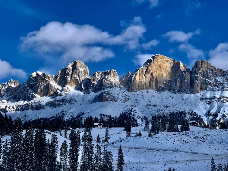 the mountain covered with snow is full of snow