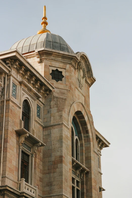 the dome on top of this old building features a cross