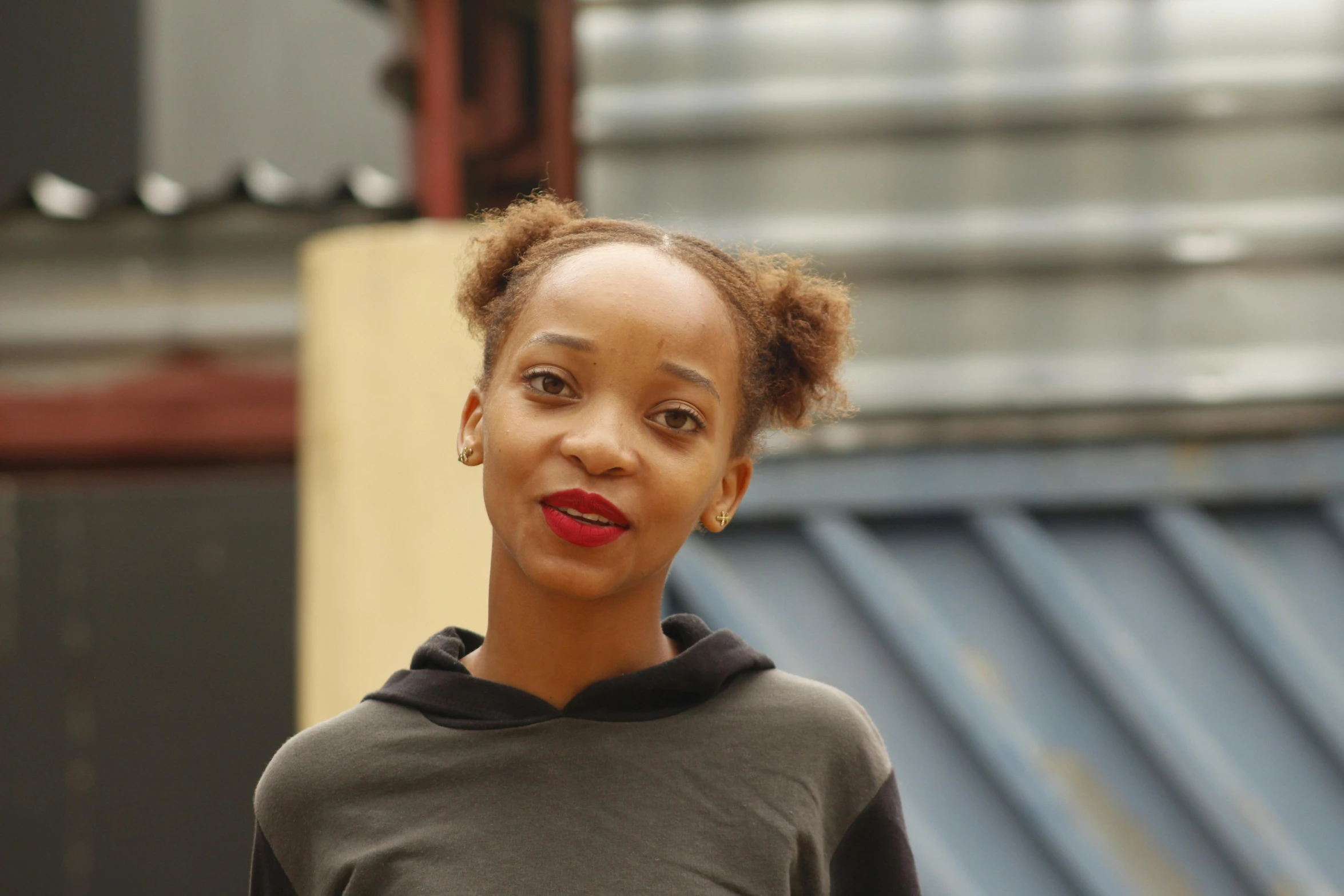 a close up view of a person with red lipstick