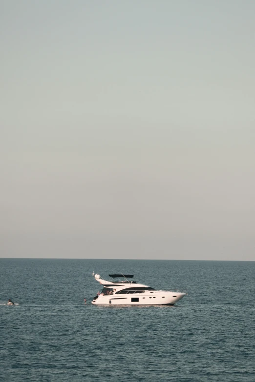 the boat is in the water near the shoreline