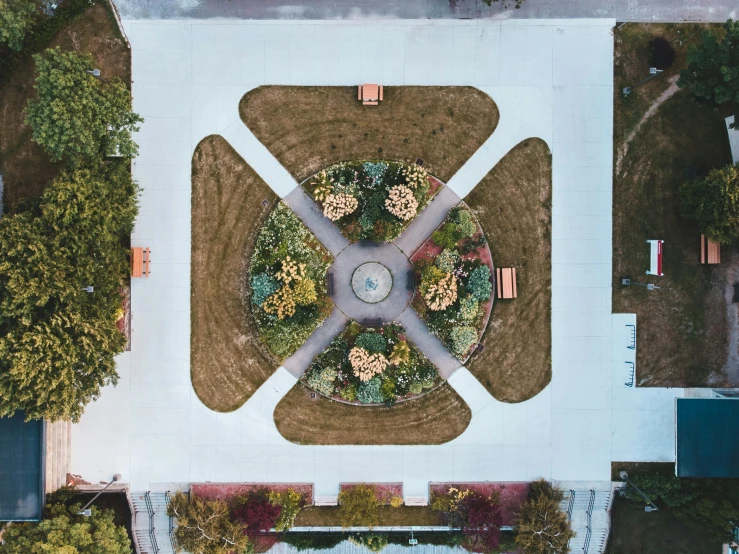 an aerial view of the lawn at the end of an outdoor garden