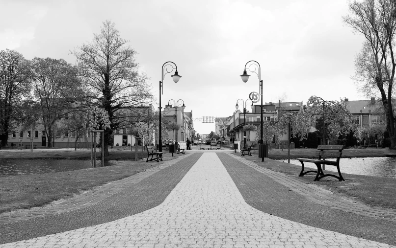 black and white po of a path in front of a building