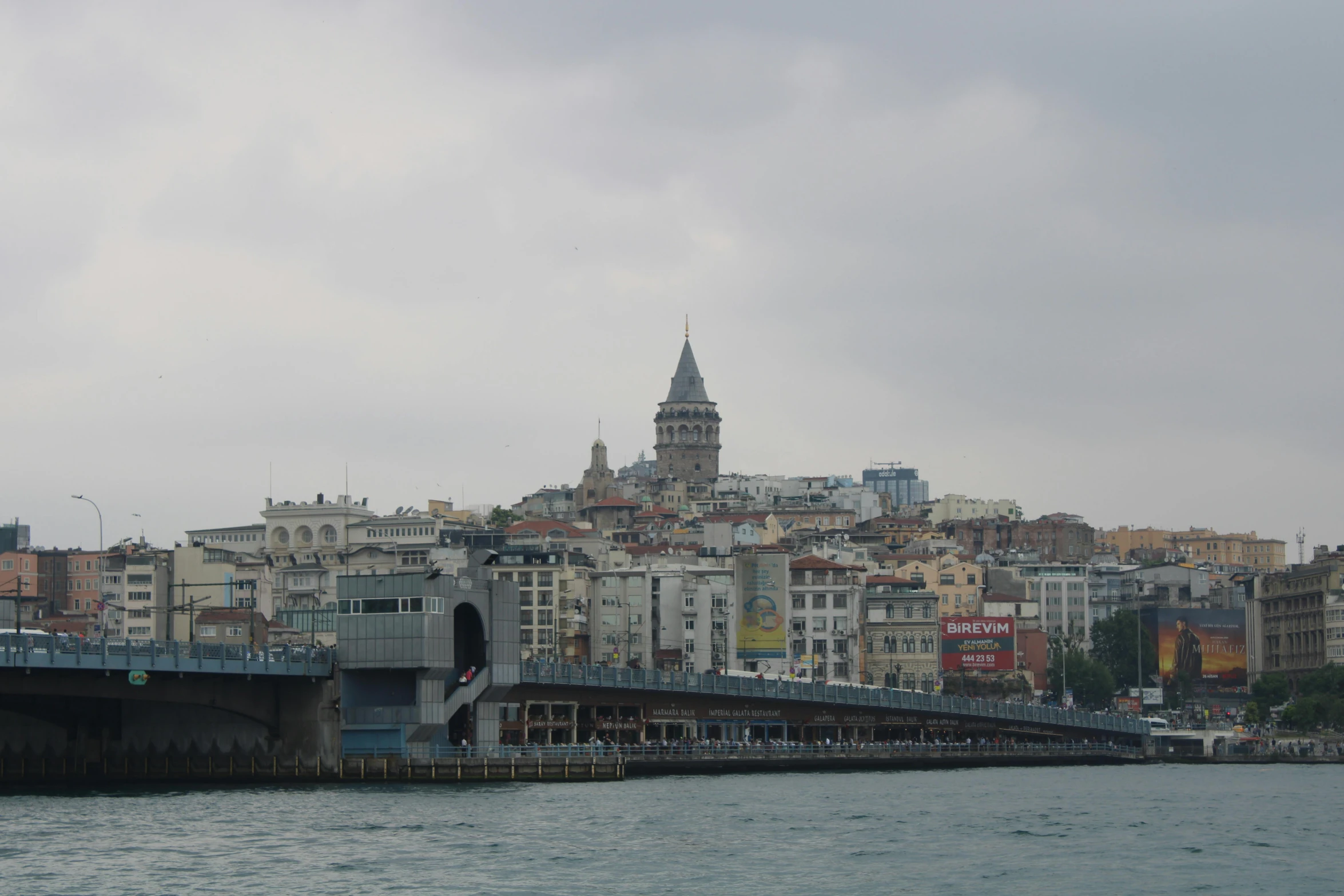 a city skyline next to the river