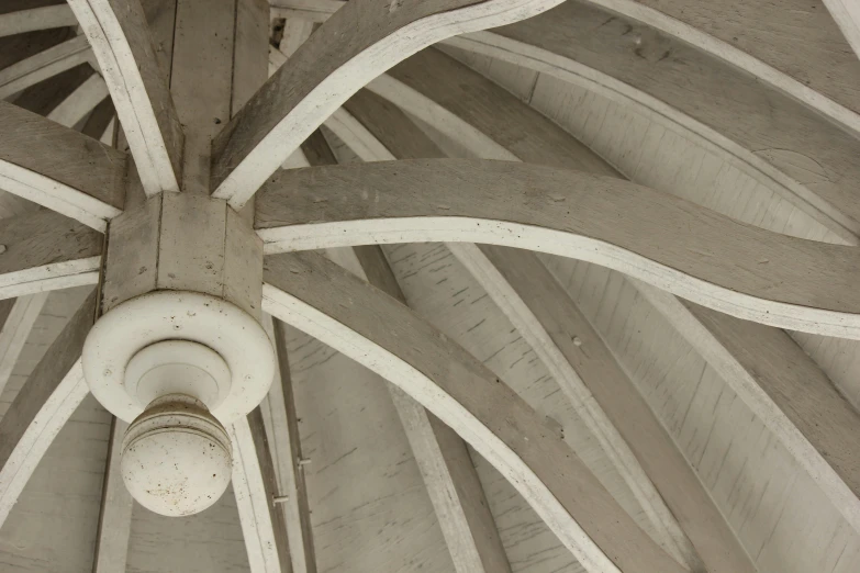 a large ceiling with a clock on top of it