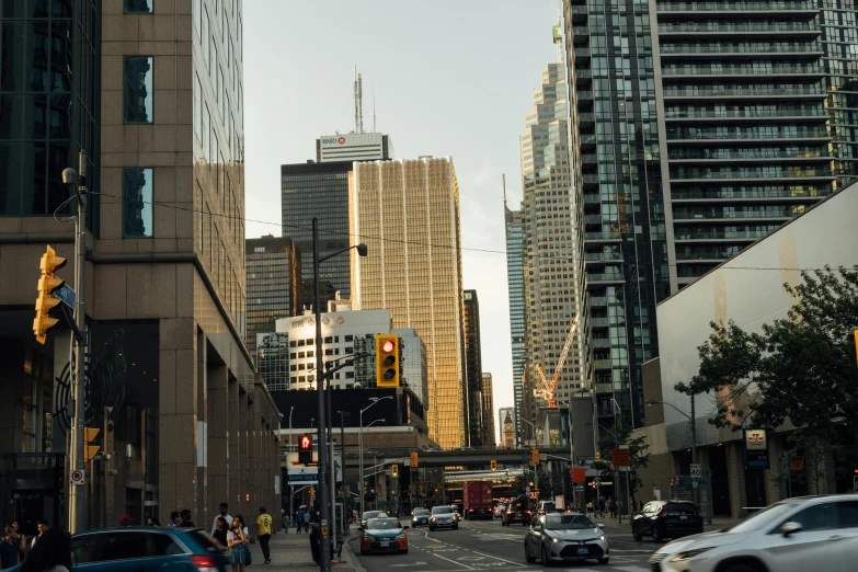 a street full of cars and tall buildings