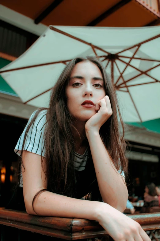 a woman poses for the camera with a beautiful, long hair