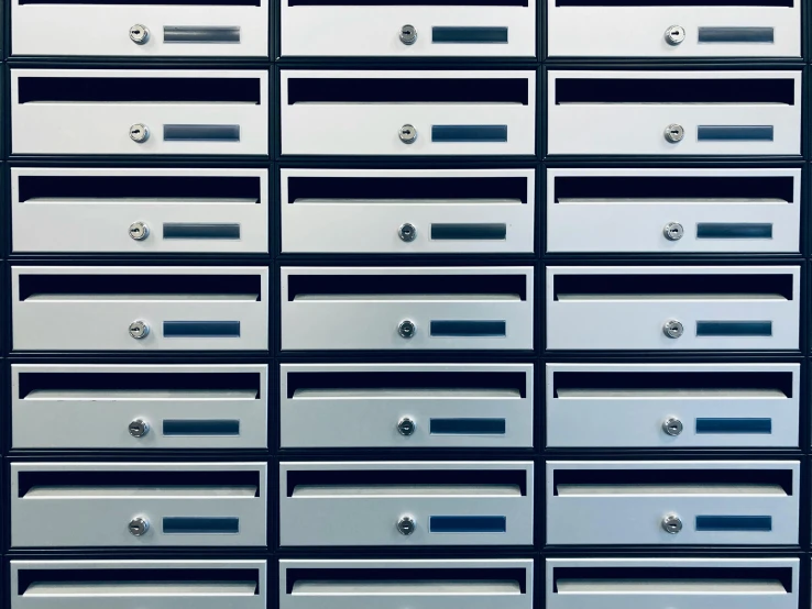 a large stack of drawers with multiple files on it