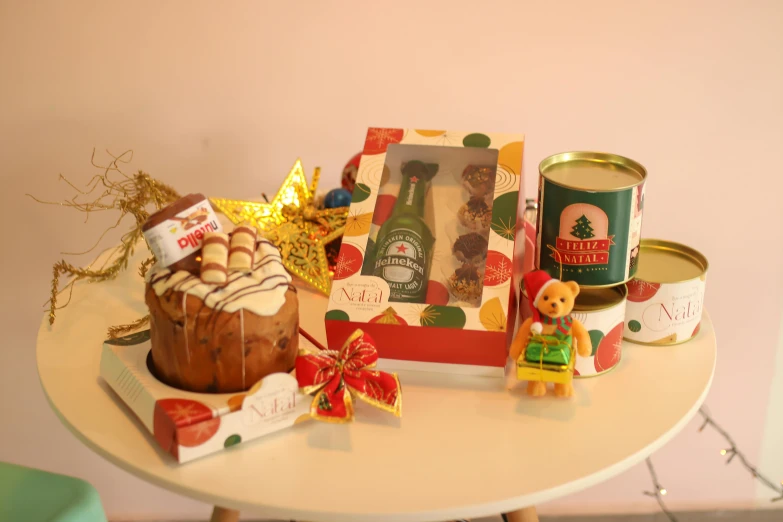 a christmas treat sitting on top of a table next to a can and cookie