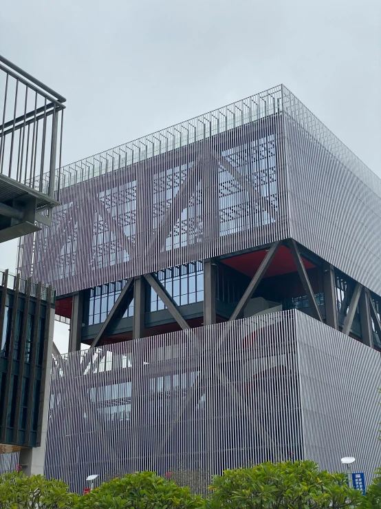 large structure with blue, white and red panels on top