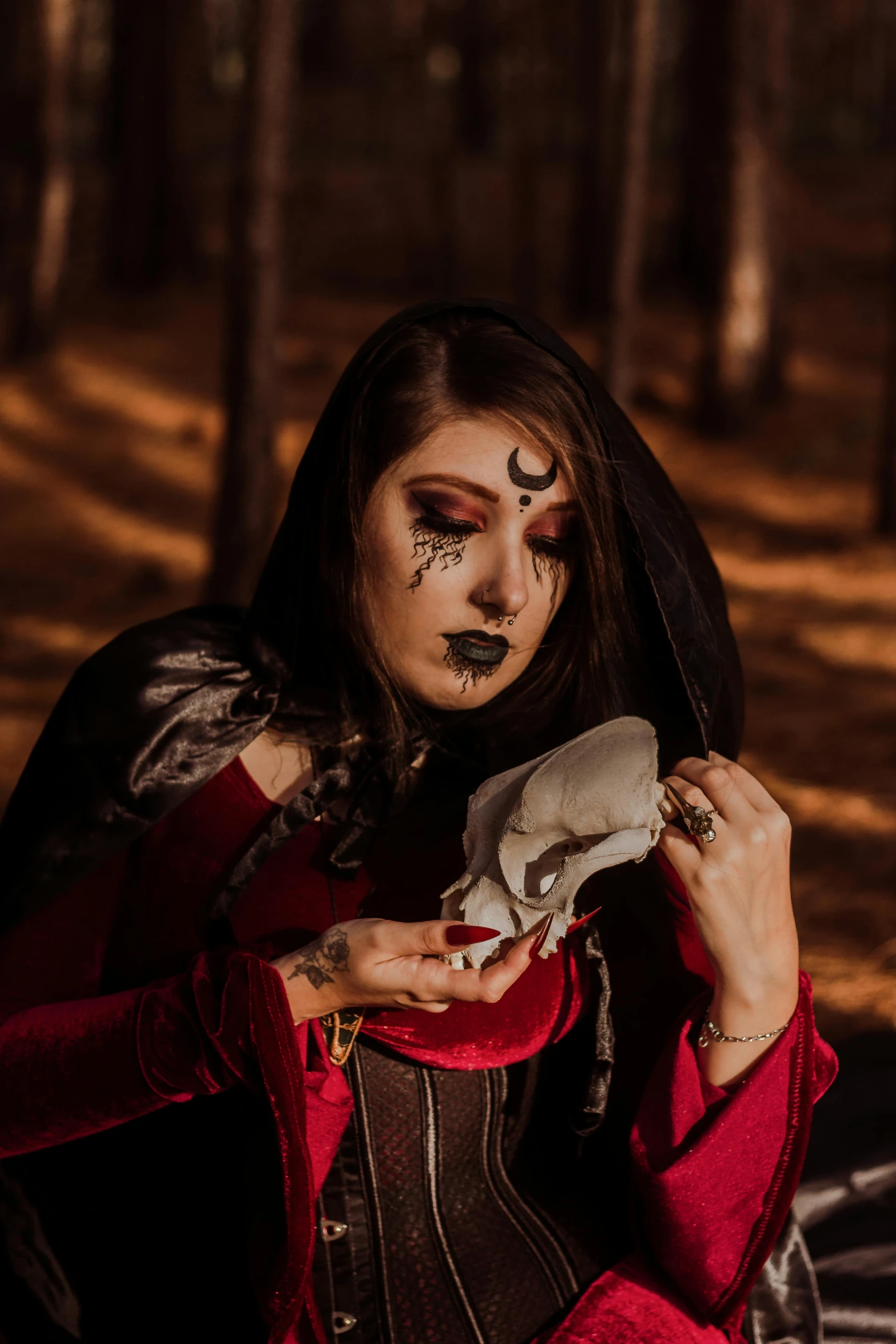 the woman is dressed in makeup as she eats soing