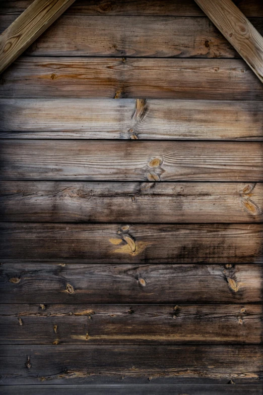 an old wooden cabin or barn wall with no roof