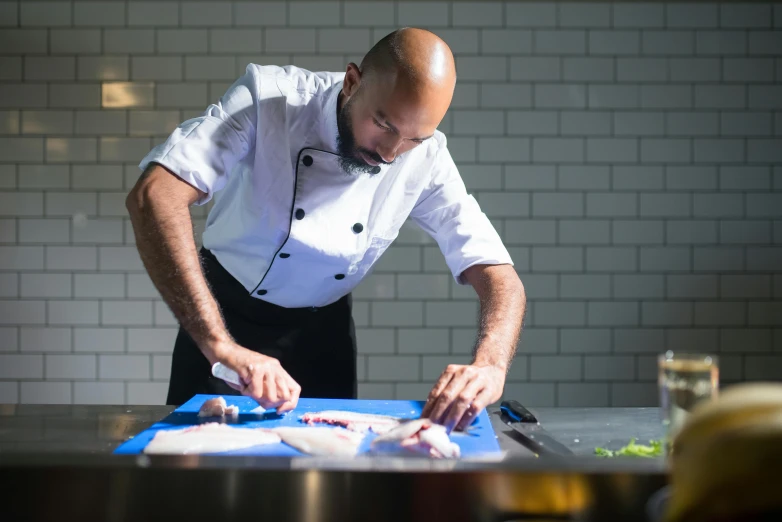 a chef in his commercial kitchen  food