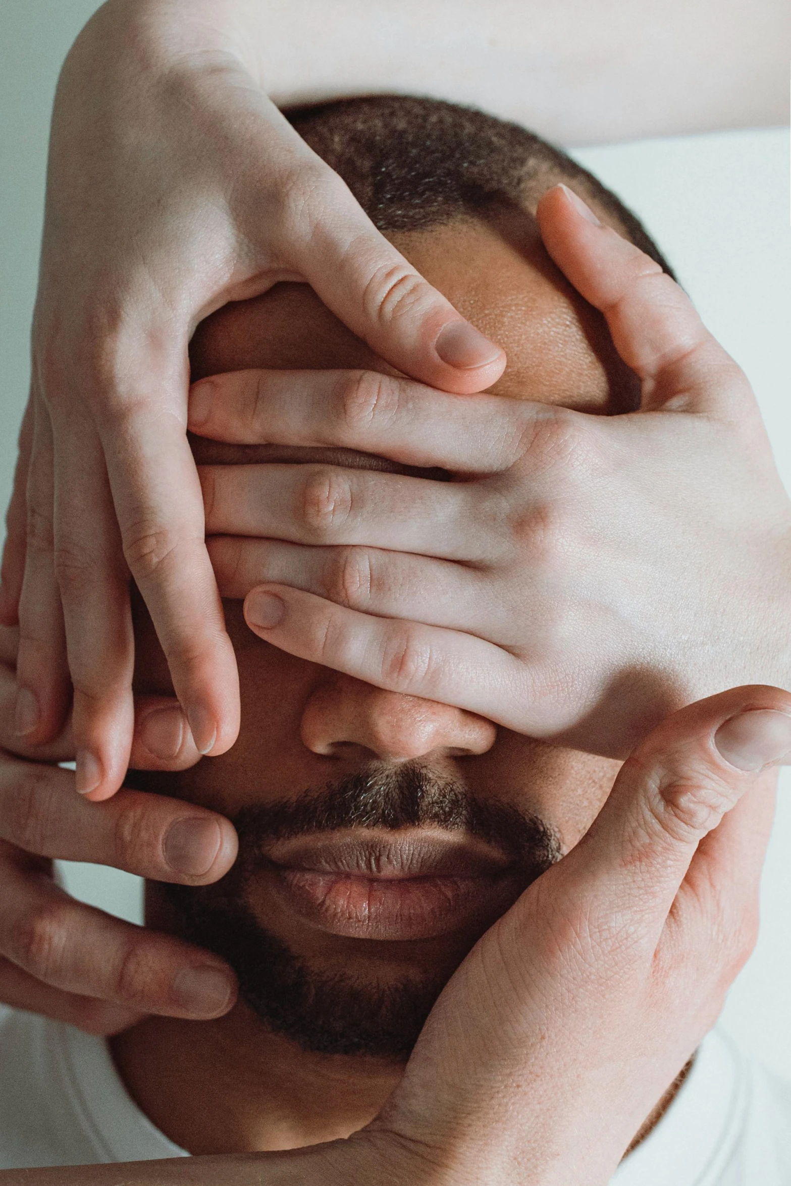 a person holding two hands together