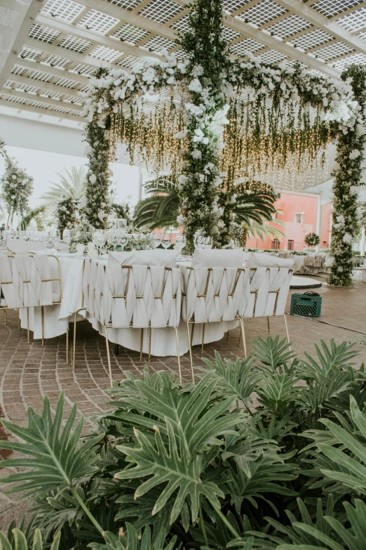 the table is set with chairs for a formal event