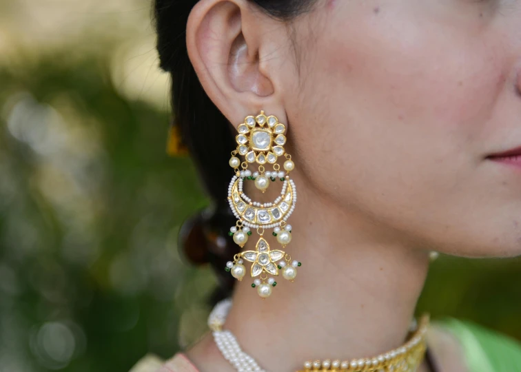 a person wearing some very pretty jewelry