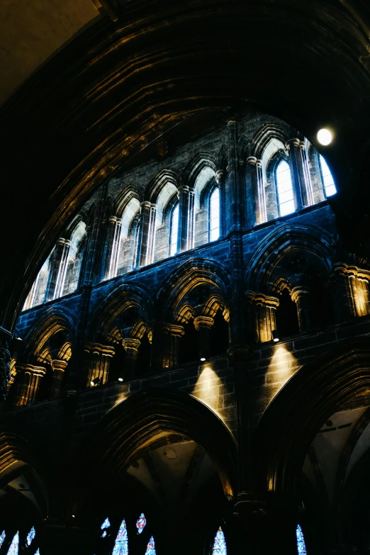 an interior of the main building is lit by the light coming from the windows