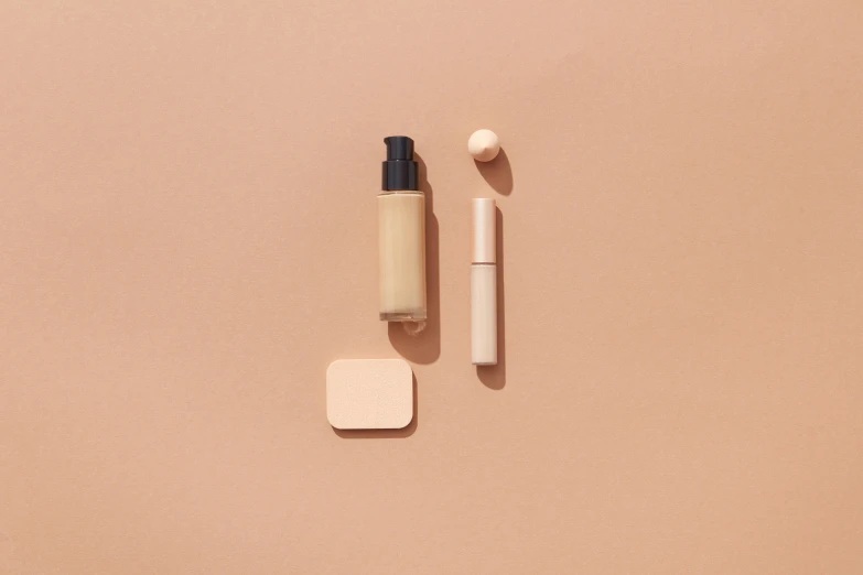 an image of some make up items on a surface