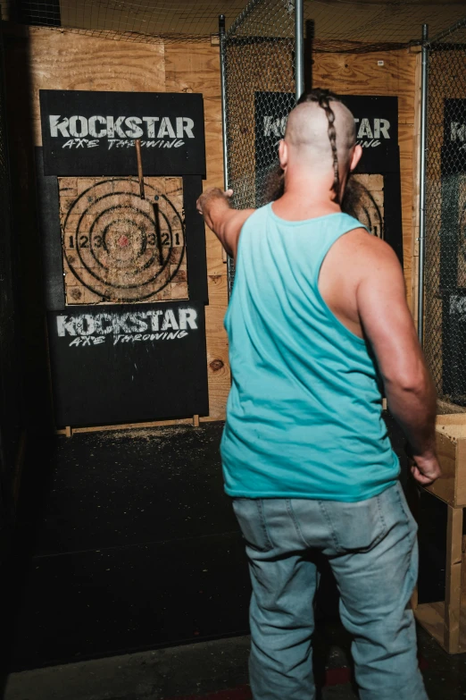 a person looking at an abstract artwork on a wall