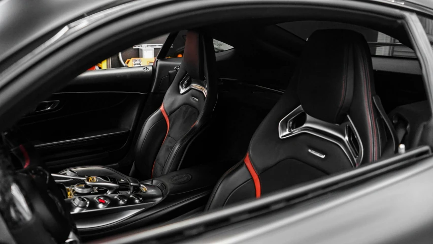 view of the front seats of a car from inside