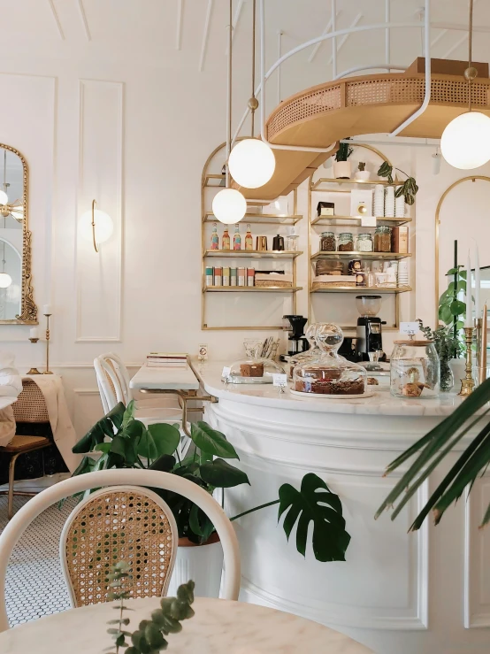 inside of an indoor cafe setting with white walls