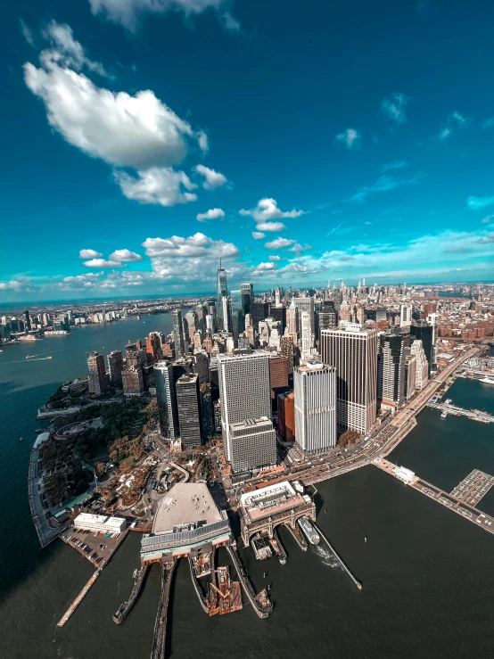 an aerial view of the new york city with its bridge