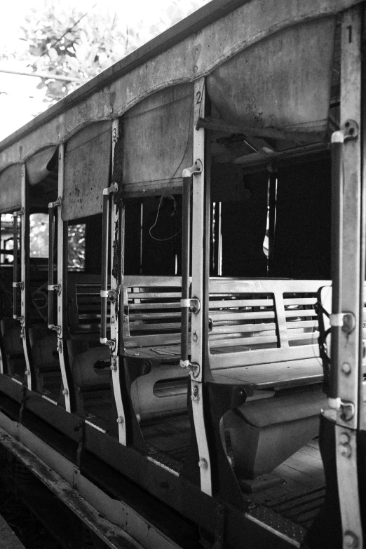 an empty train with a bunch of seats