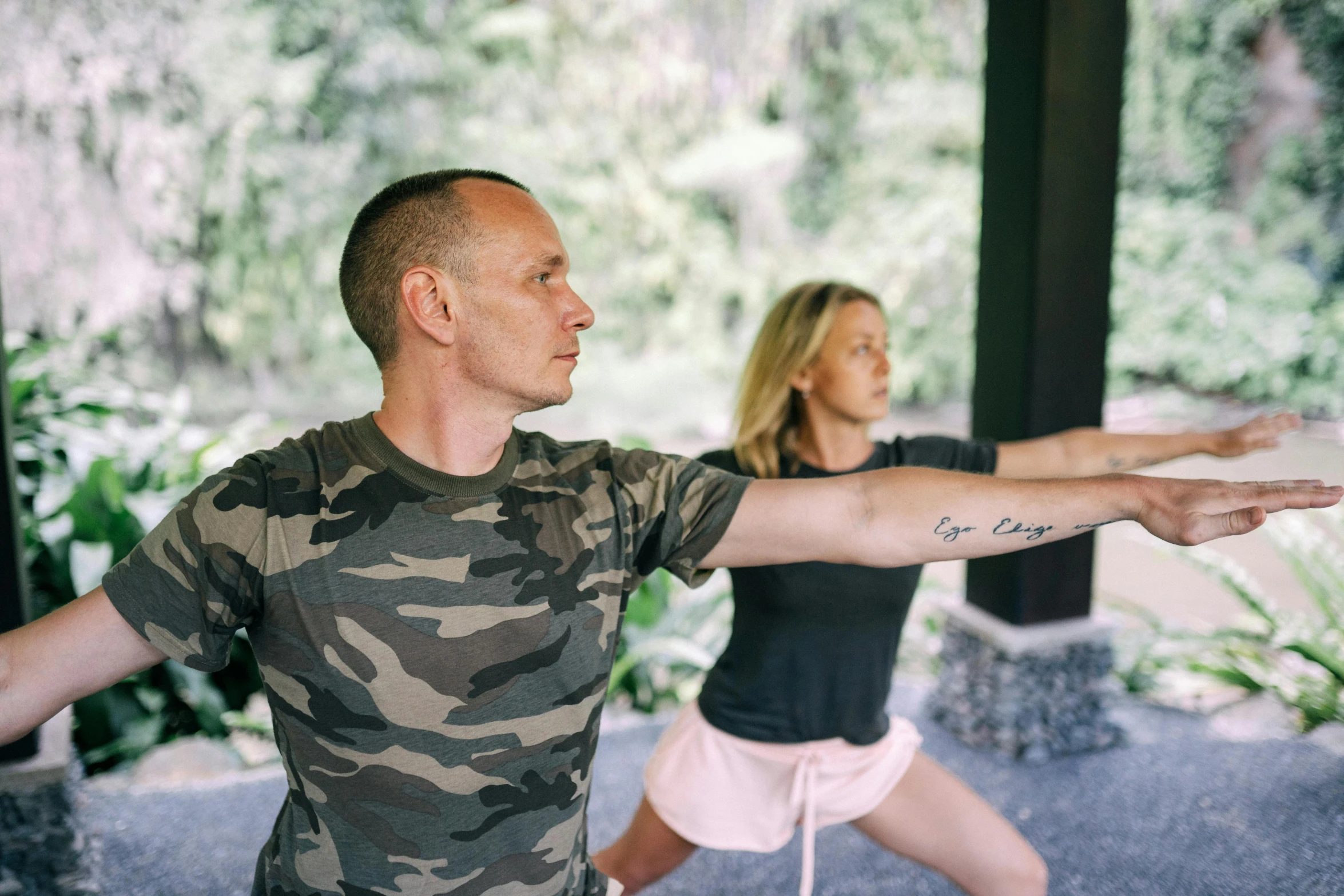 the woman is doing exercises on her hand and leg