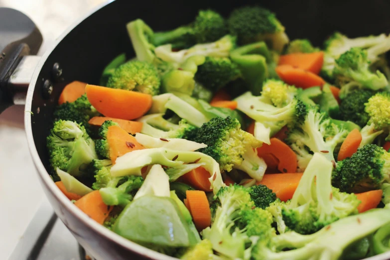 the vegetables are stir fried and in the pot