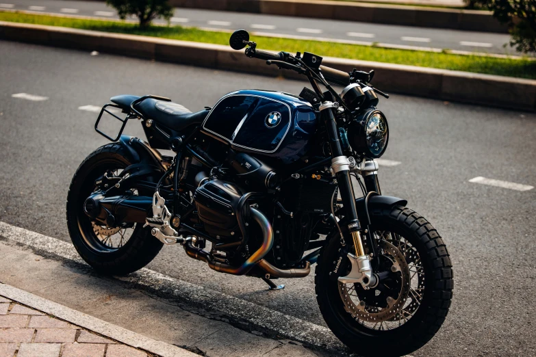 a black motorcycle parked on the side of the road