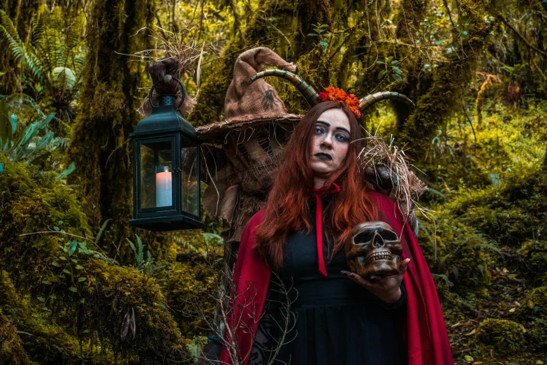 a woman in a costume with a scary face and red hair