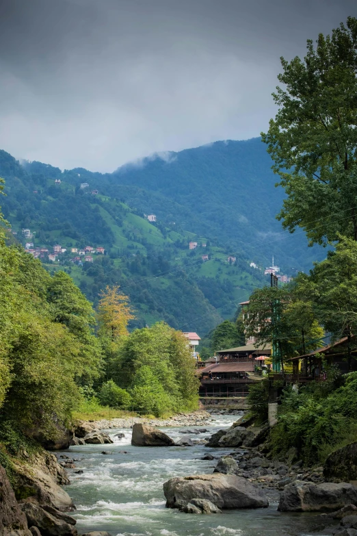 this is an image of a river flowing through the mountains