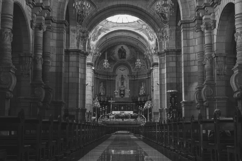 inside an old cathedral with lots of pillars and arches