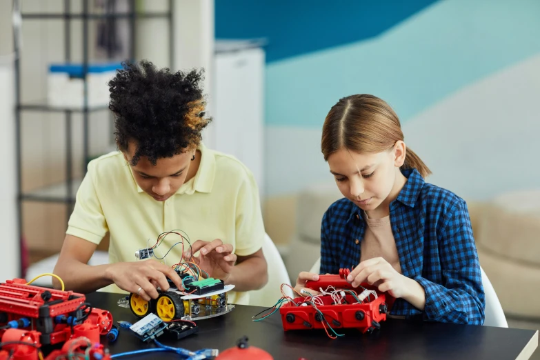 two children playing with various types of toys