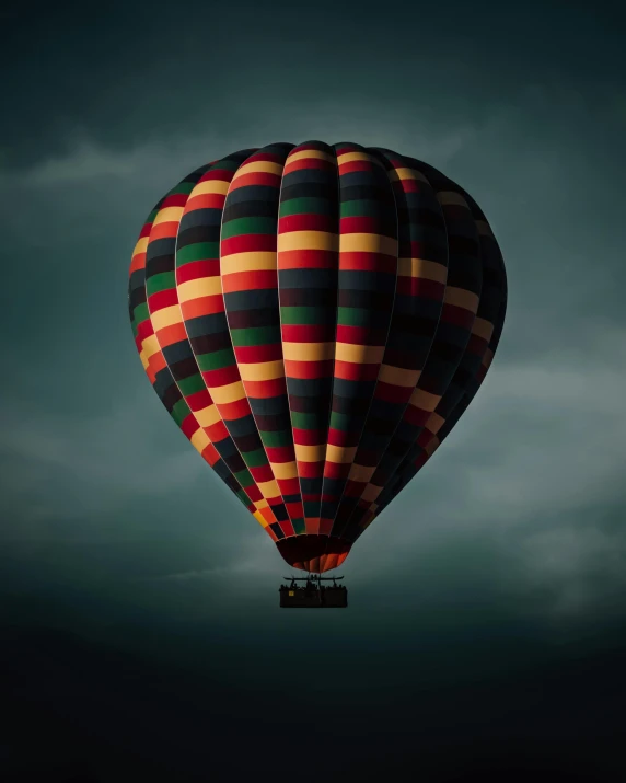 a large colorful  air balloon in the sky