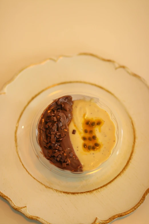 an empty plate with chocolate dessert and sauce on it